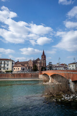 Obraz premium Images of the city of Verona in Italy. Classic buildings, bridges over the Adige river and churches of the city.