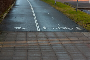 Road marked as reserved for walking and two lane bicycling.