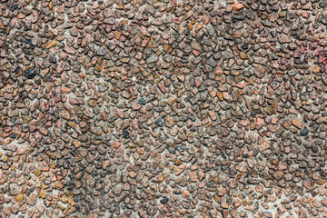 Gothenburg, Sweden - February 20 2022: Gravel embedded in a concrete plate used as a wall element.