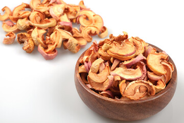 Dried apples in a bowl on white background	