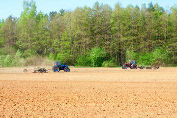 Ploughing tractor during cultivation agriculture