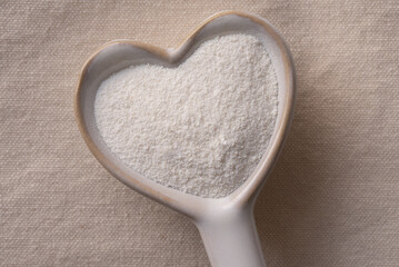 Coffee Creamer Powder on a Heart Shape - 491713889