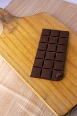chocolate pieces on white background