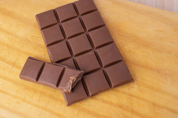 chocolate pieces on white background