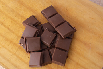 chocolate pieces on white background