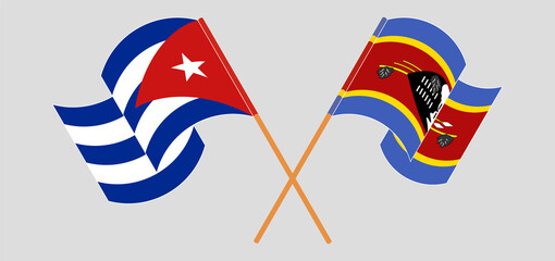 Crossed and waving flags of Cuba and Eswatini