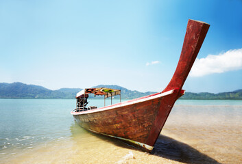 Traditional Thai boat. Traditional Thai long tail boat on the beach - Thailand.