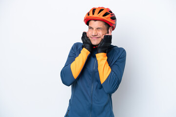 Young cyclist caucasian man isolated on white background frustrated and covering ears