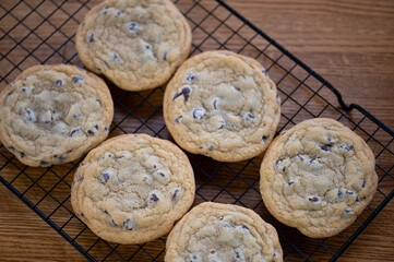 flat lay homemade chocolate chip cookies, intentional shallow depth of field, selective focus