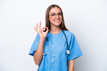 Young nurse caucasian woman isolated on white background showing ok sign with fingers