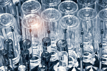 The glass bulb, Chemical or pharmaceuticals flask in the washing machine. Chemical vessels. Glassware, Washing, cleaning