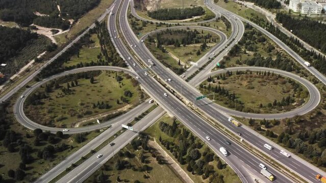 Aerial view of highway and overpass in city. High quality 4k footage