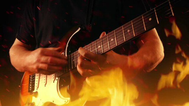 Musician Finger Tapping Guitar Solo In Fire