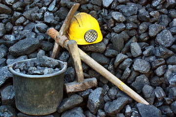 Polish coal of mine deposit showing with miners equipment