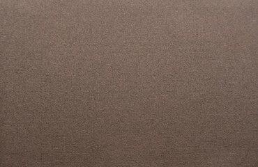 Old vintage paper texture. Brown background. Rustic wallpaper. Retro image