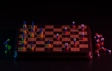 Chess in the colors of Ukraine and Russia on dark background. The concept of defense of Ukraine. Russia's fight against Ukraine. The war in Ukraine. 3D render, 3D illustration.