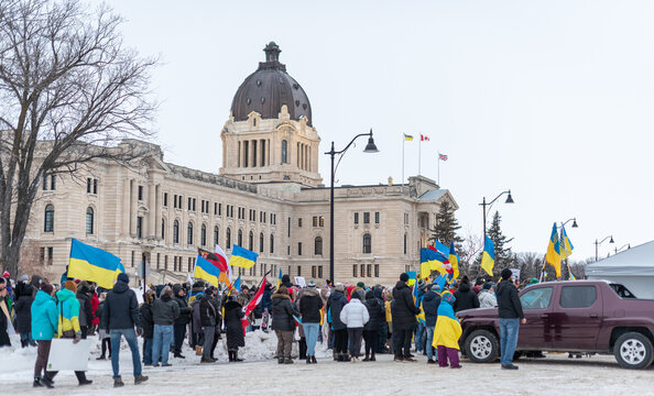 Group Of People On The Street With Ukrainian Flags At The Anti-war Demonstration In Regina, Saskatchewan, Canada.