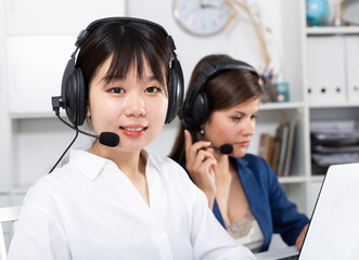 Operators working with computers in an office