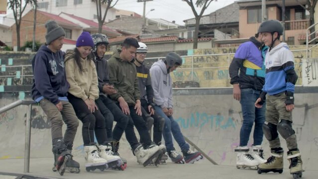 group of rollerbladers in front of camera, smiling
