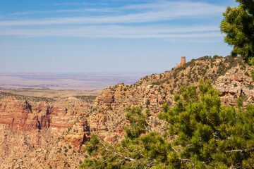 Mary Colter's desert view watchtower on slope of sedimentary rock at Grand Canyon Arizona