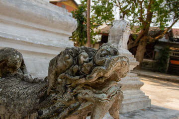Fototapeta na wymiar lion statue guarding an Asia temple