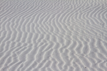 Fototapeta na wymiar white sand ripples in the sand