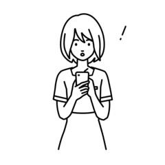 立ってスマートフォンを操作して何かに気づいて驚いたエステ店員・受付・接客業の女性