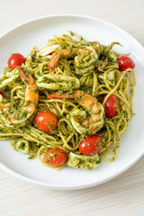 Spaghetti with seafood in homemade pesto sauce