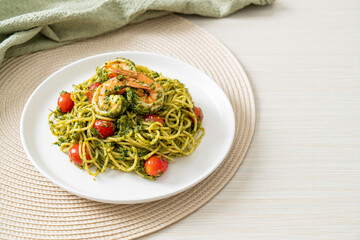 Spaghetti with prawns or shrimps in homemade pesto sauce