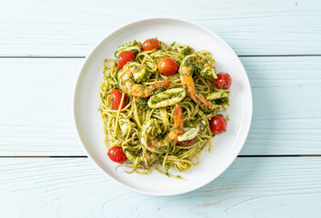 Spaghetti with seafood in homemade pesto sauce