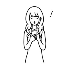 立ってスマートフォンを操作して何かに気づいて驚いたドレスの女性