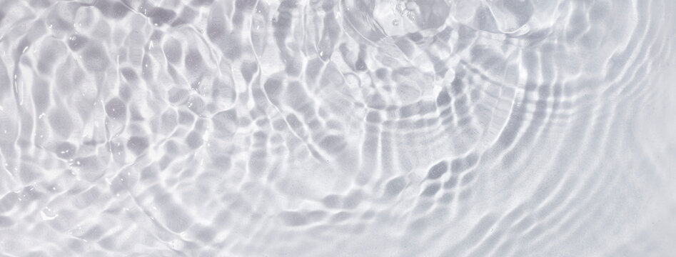 透明感のある水の波紋の背景テクスチャー © hanahal