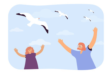 Happy girls looking at seagulls in sky flat vector illustration. Smiling friends raising hands, spending summer vacation at sea. Travel, trip concept for banner, website design or landing web page