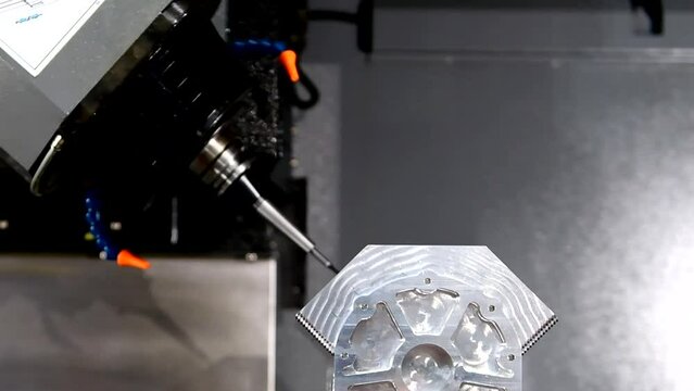The 5-axis CNC mills machines for design configuration that utilizes a swivel head machine table and flush with the surface metalworking industrial