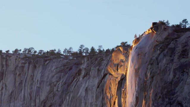 close tilt up clip of horsetail falls at sunset in yosemite national park of california, usa