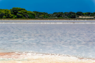 Sea salt field during hot summer day at Formentera island, Spain.