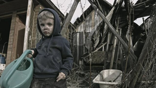 A child is crying^ playing in the ruins