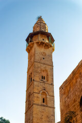 Fototapeta premium The old mosque minaret inside the Old Town of Jerusalem, Israel. 