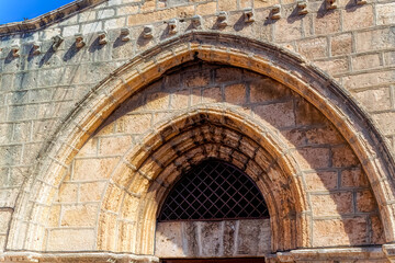 Fototapeta premium Entrance gate to the old church inside Old City in Jerusalem, Israel.