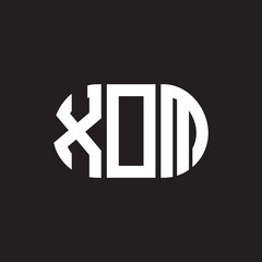 XOM letter logo design. XOM monogram initials letter logo concept. XOM letter design in black background.