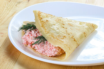 Pancake with crab and cream
