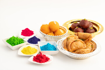 Holi Color Powder With Indian Mithai Gujia Or Gujiya, Gujiya, Pirukiya, Pirukia, Pedakiya, Karanji, Basundi, Kala Jamun, Gulab Jamun, Special Laddu, Bundi Motichur Laddoo Or Boondi Motichoor Ladoo