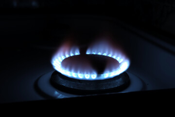 Natural gas, energy crisis. Flame from a gas stove, energy concept