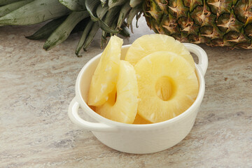 Marinated pineapple rings in the bowl