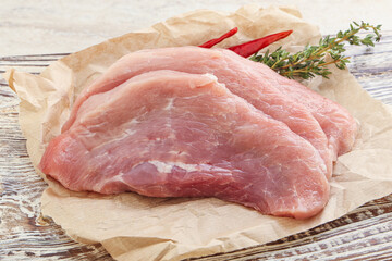 Raw pork schnitzel for roast