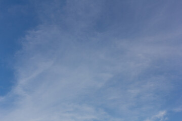 Obraz premium white fluffy clouds in the blue sky, nature background