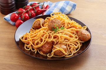 Spaghetti with meatball in tomato sause