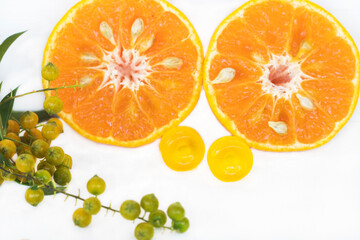 cough sore throat pastille colorful extract from fruits orange arrangement flat lay style on background white 