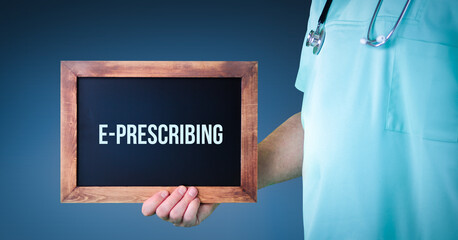 E-Prescribing (Electronic Prescribing). Doctor shows sign/board with wooden frame. Background blue