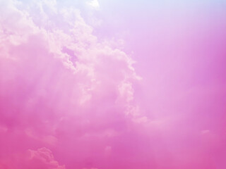 Fototapeta premium pink sky background with white clouds There was a ray of sunshine as if in heaven.
